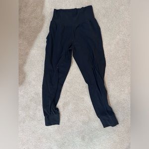 Black Athleta joggers.